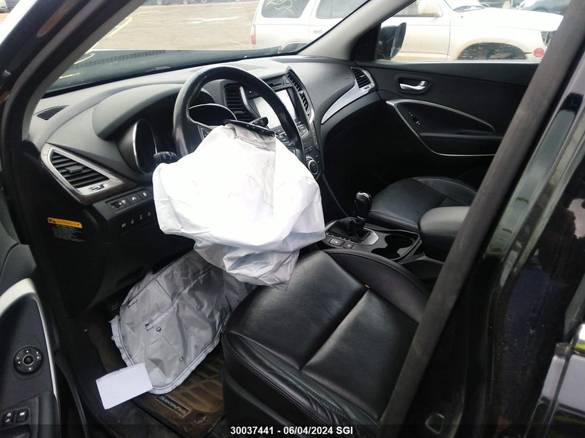 2016 Hyundai Santa Fe Se/Limited VIN: KM8SNDHF5GU160772 Lot: 30037441