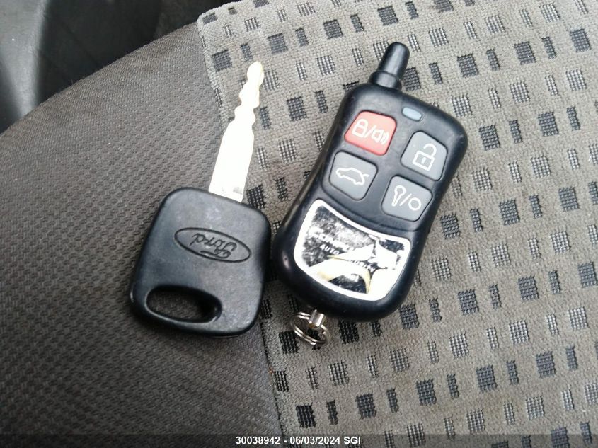 2005 Ford Focus Zx4 VIN: 1FAFP34N75W309021 Lot: 30038942