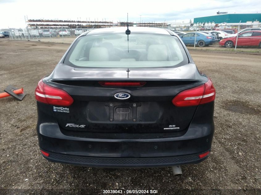 2015 Ford Focus Se VIN: 1FADP3F2XFL309401 Lot: 30039043