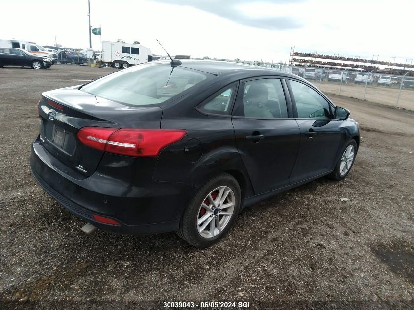 2015 Ford Focus Se VIN: 1FADP3F2XFL309401 Lot: 30039043