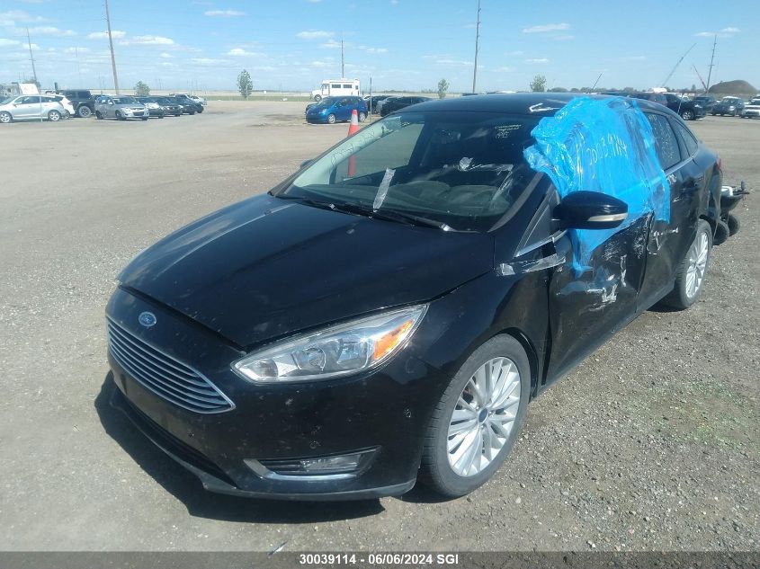 2016 Ford Focus Titanium VIN: 1FADP3J28GL277993 Lot: 30039114