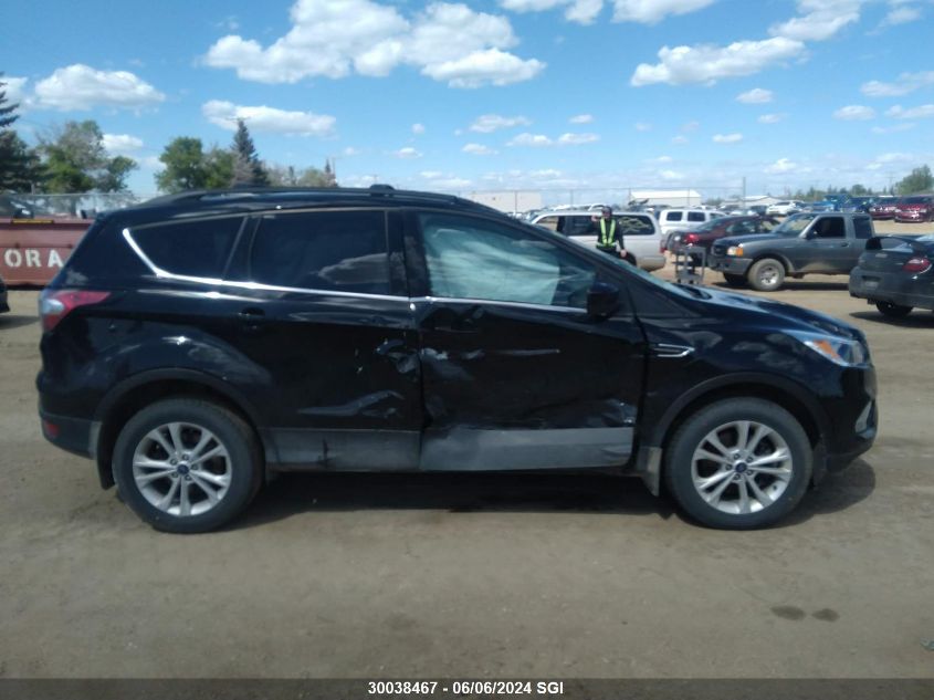 2018 Ford Escape Se VIN: 1FMCU9GD7JUB57299 Lot: 30038467