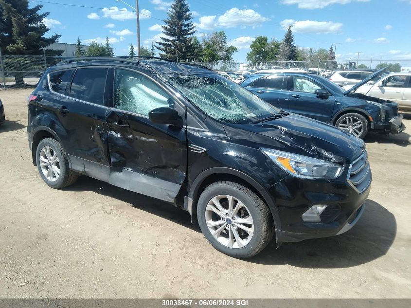 2018 Ford Escape Se VIN: 1FMCU9GD7JUB57299 Lot: 30038467