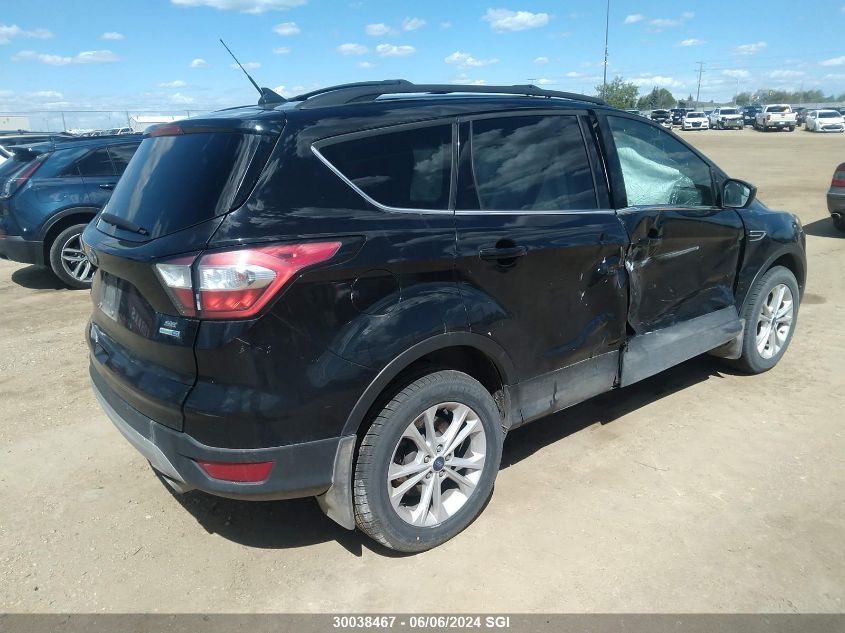 2018 Ford Escape Se VIN: 1FMCU9GD7JUB57299 Lot: 30038467