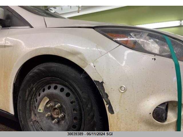 2012 Ford Focus Titanium VIN: 1FAHP3J24CL406419 Lot: 30039389