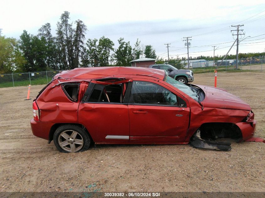 2010 Jeep Compass Sport VIN: 1J4NF4FB0AD599202 Lot: 30039382