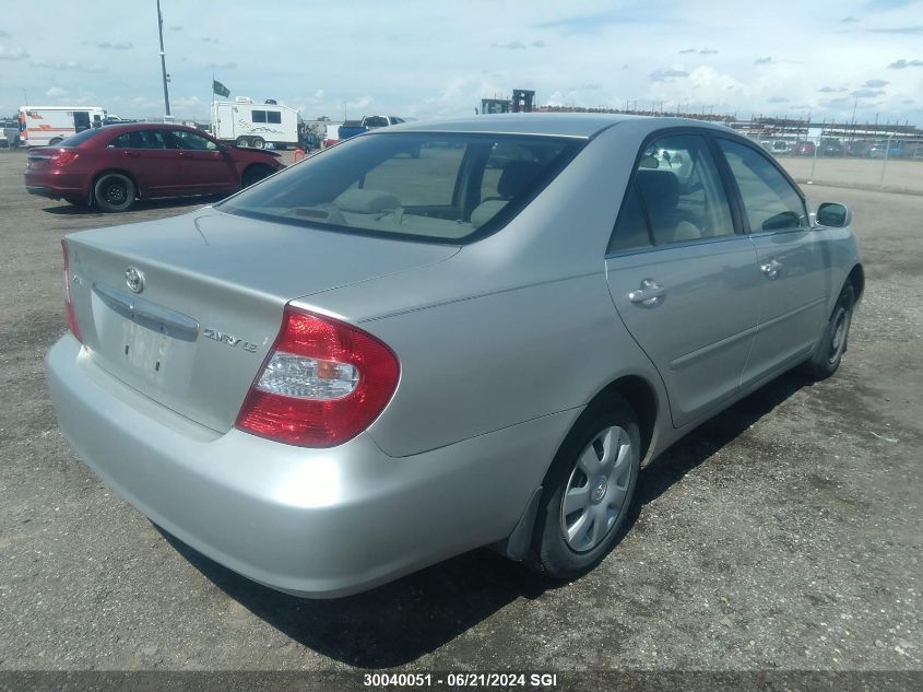 2003 Toyota Camry Le/Xle VIN: JTDBE32KX30223497 Lot: 30040051