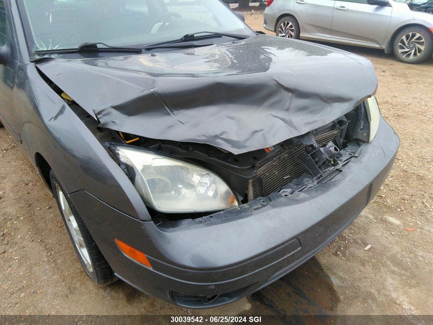 2007 Ford Focus Zx5/S/Se/Ses VIN: 1FAFP37N67W140642 Lot: 30039542