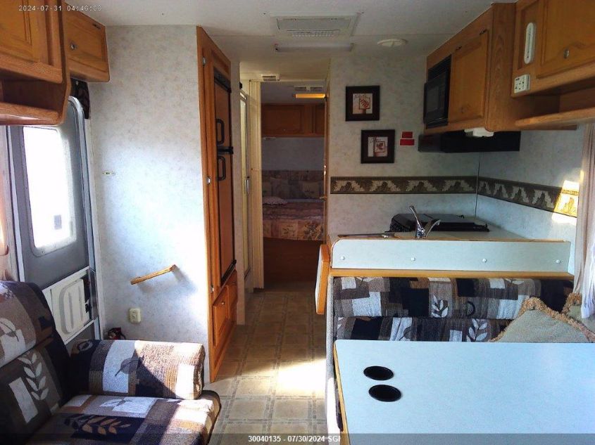 2003 Ford Econoline E450 Super Duty Cutwy Van VIN: 1FDXE45S13HA58640 Lot: 30040135