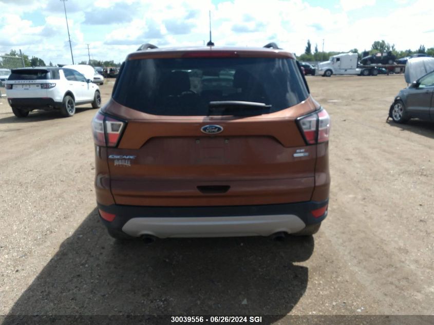 2017 Ford Escape Se VIN: 1FMCU9GD7HUD21614 Lot: 30039556