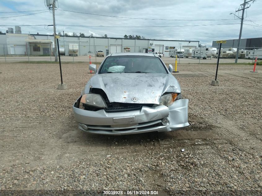 2003 Hyundai Tiburon Se VIN: KMHHN65D53U058052 Lot: 30039928