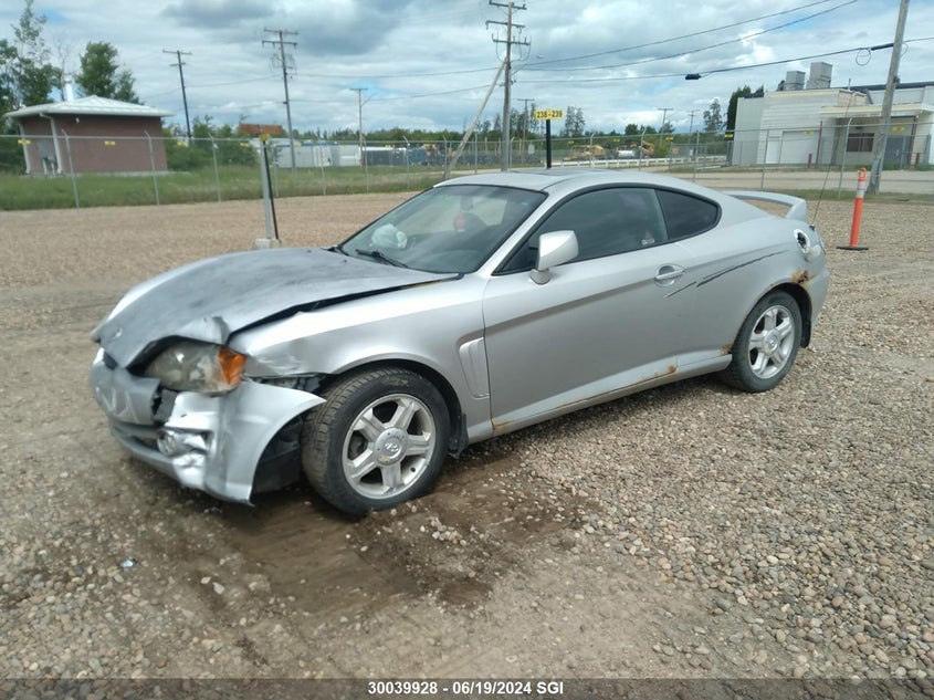 2003 Hyundai Tiburon Se VIN: KMHHN65D53U058052 Lot: 30039928