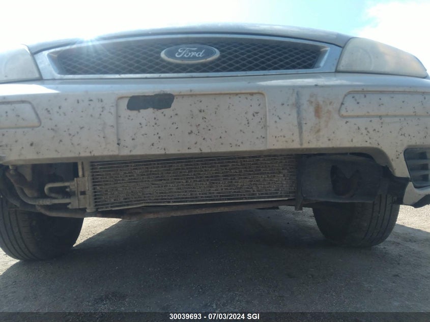 2007 Ford Focus Zx4/S/Se/Ses VIN: 1FAFP34N17W308885 Lot: 30039693