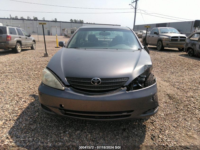 2003 Toyota Camry Le/Xle VIN: JTDBE30KX30145211 Lot: 30041572
