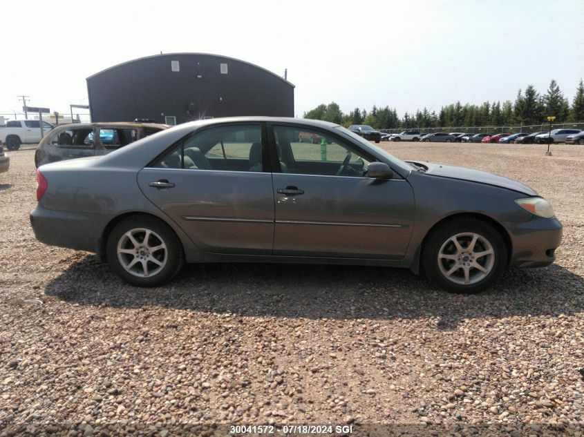 2003 Toyota Camry Le/Xle VIN: JTDBE30KX30145211 Lot: 30041572