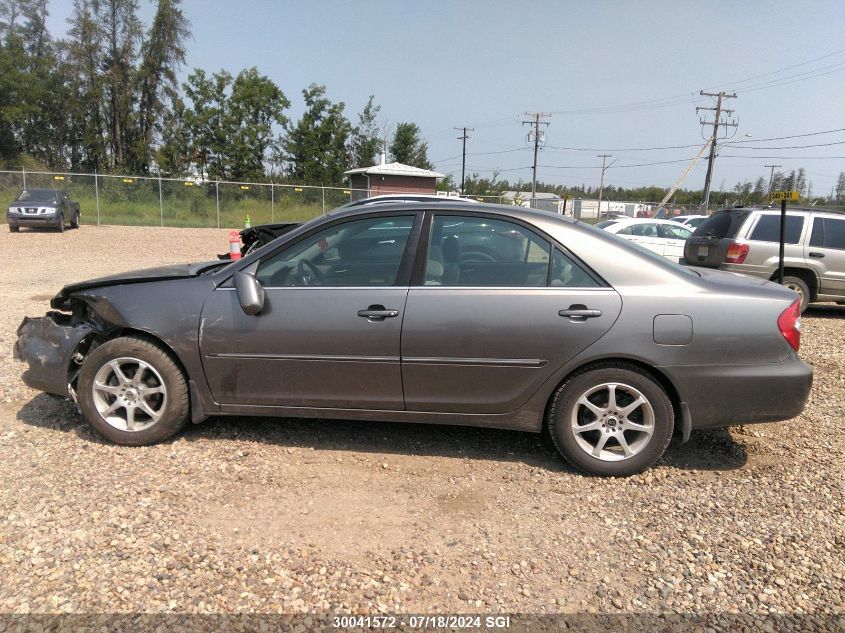 2003 Toyota Camry Le/Xle VIN: JTDBE30KX30145211 Lot: 30041572