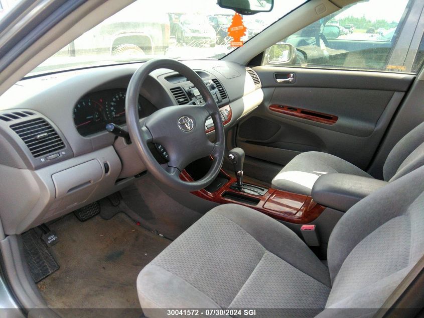 2003 Toyota Camry Le/Xle VIN: JTDBE30KX30145211 Lot: 30041572