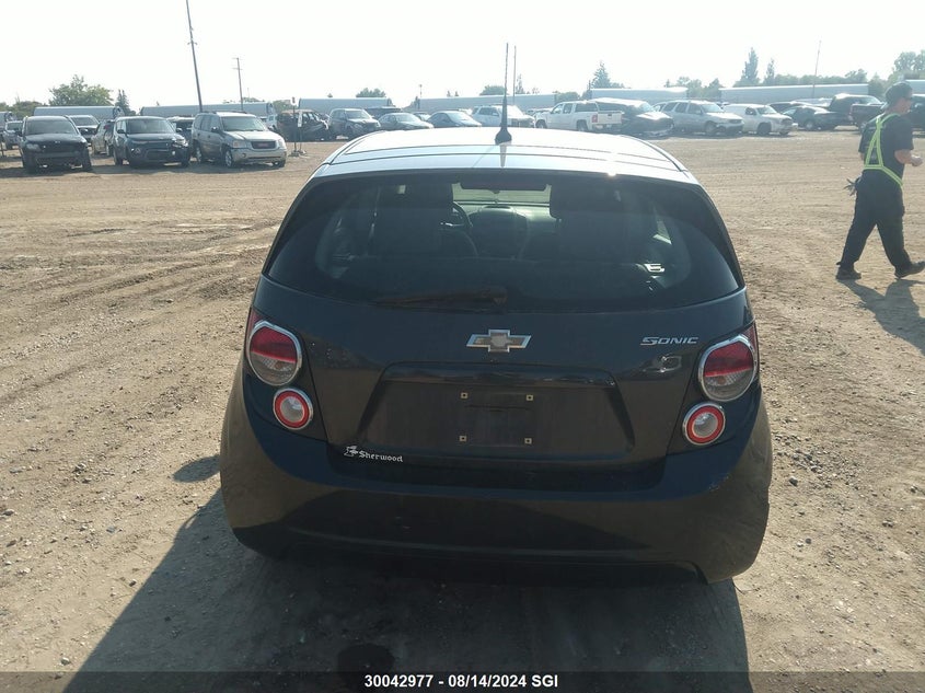2014 Chevrolet Sonic Ls VIN: 1G1JA6EH0E4149214 Lot: 30042977