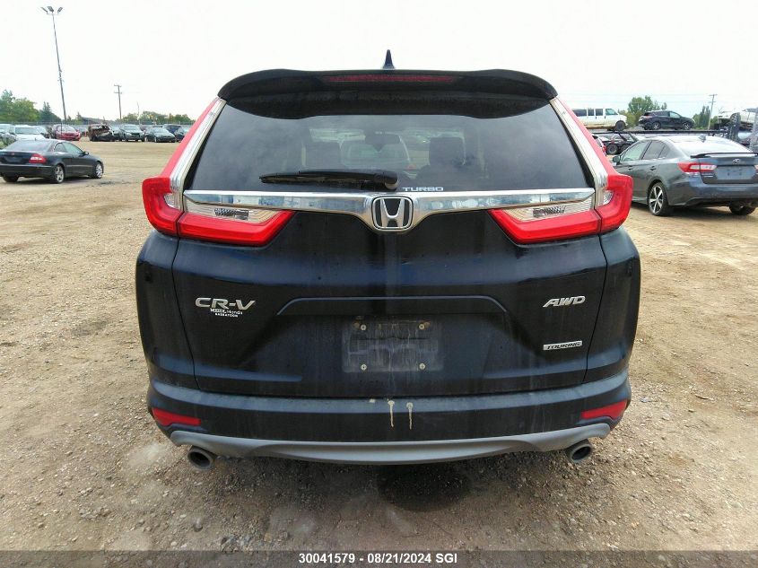 2019 Honda Cr-V Touring VIN: 2HKRW2H93KH131529 Lot: 30041579