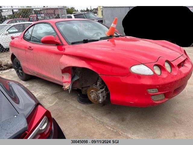 2001 Hyundai Tiburon VIN: KMHJG35F21U246603 Lot: 30045098