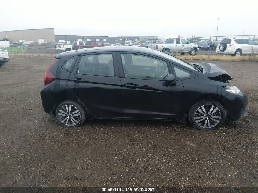 2015 Honda Fit Ex/Exl VIN: 3HGGK5G87FM104770 Lot: 30049019