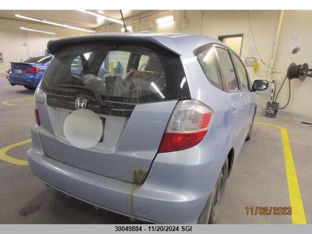 2009 Honda Fit Lx VIN: JHMGE88549S813792 Lot: 30049884