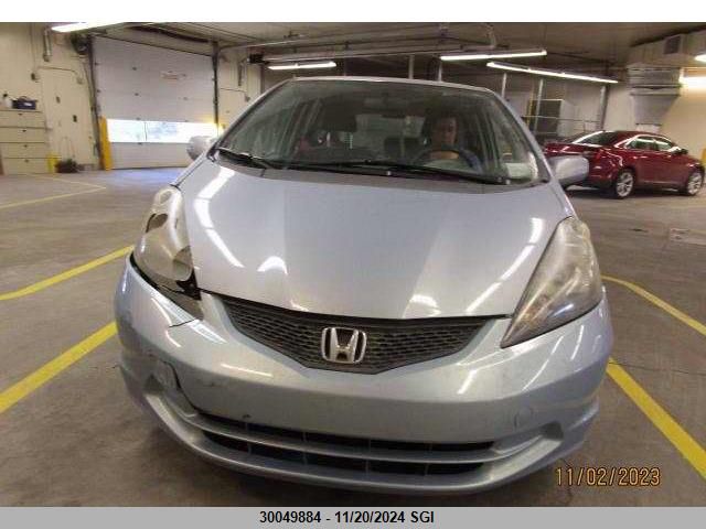 2009 Honda Fit Lx VIN: JHMGE88549S813792 Lot: 30049884