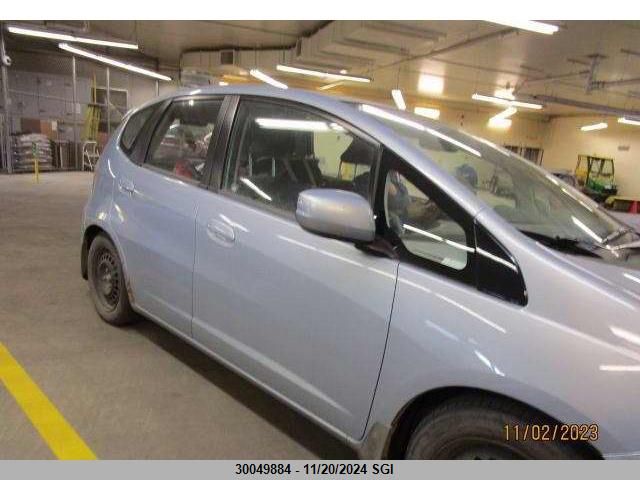 2009 Honda Fit Lx VIN: JHMGE88549S813792 Lot: 30049884