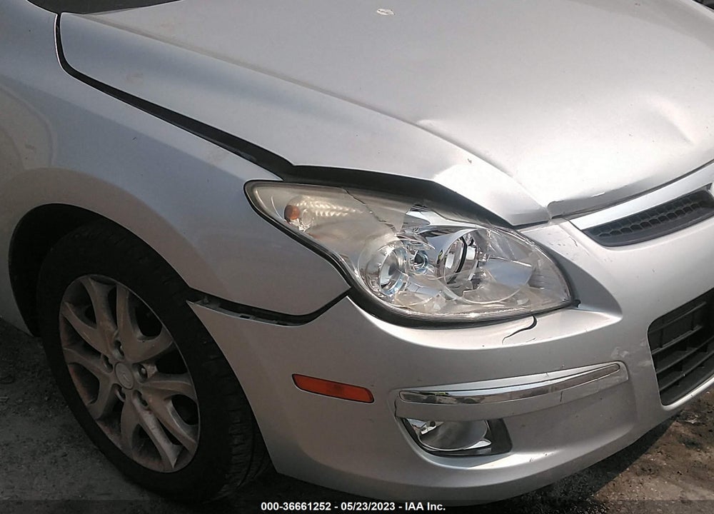 2009 HYUNDAI ELANTRA TOURING VIN: KMHDC86E79U037851