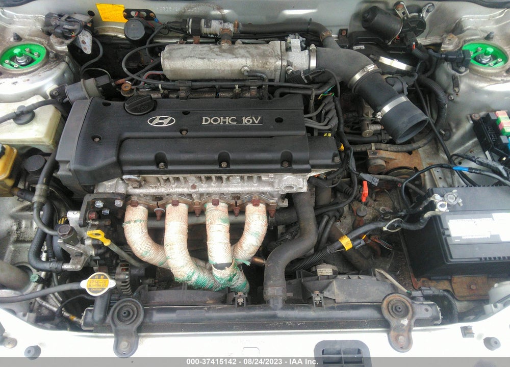 2001 HYUNDAI TIBURON VIN: KMHJG25F21U244201