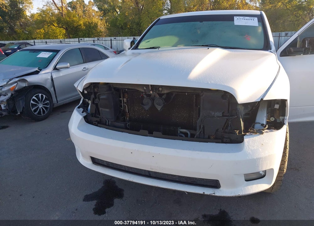 2012 RAM 1500 SPORT VIN: 1C6RD7MT2CS192661