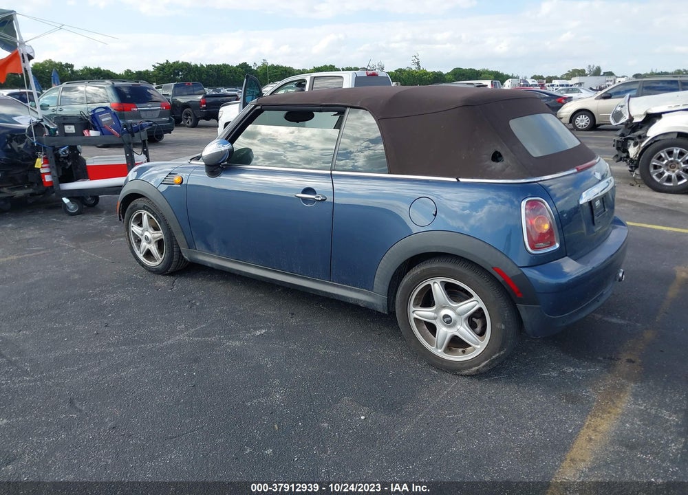 2009 MINI COOPER VIN: WMWMR33509TU95048