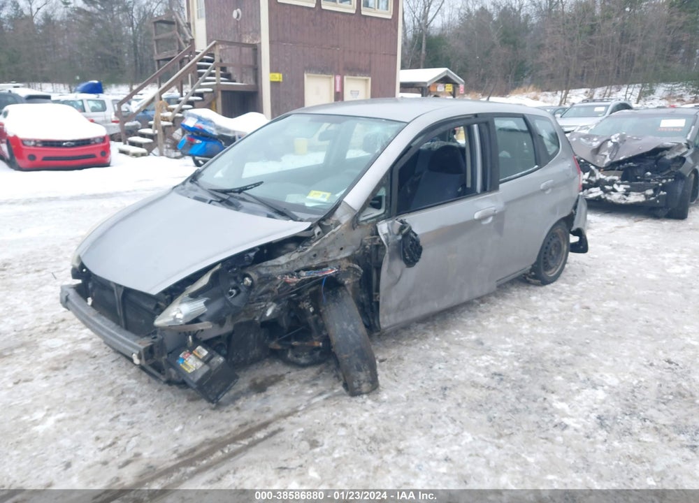 2007 HONDA FIT VIN: JHMGD374X7S062354