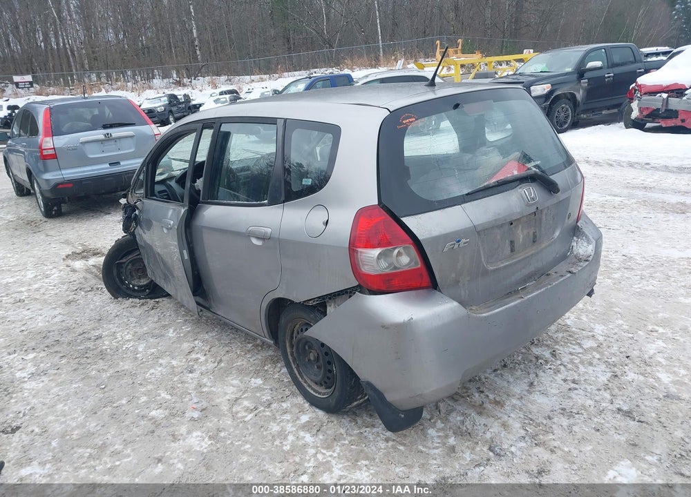2007 HONDA FIT VIN: JHMGD374X7S062354