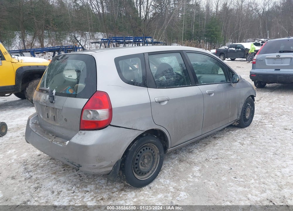 2007 HONDA FIT VIN: JHMGD374X7S062354