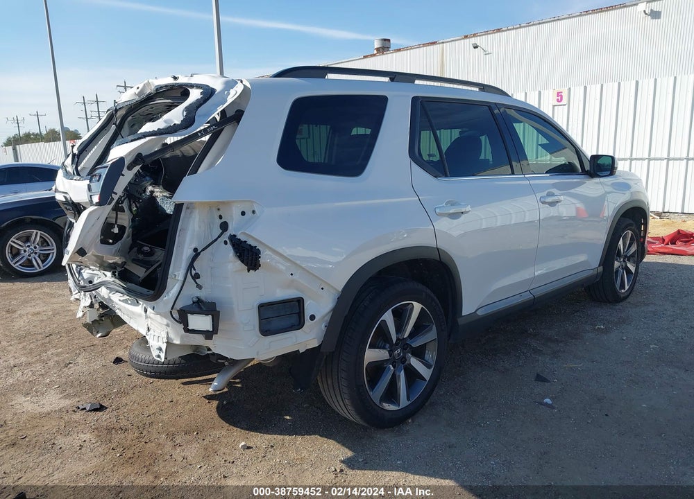 2023 HONDA PILOT 2WD TOURING VIN: 5FNYG2H79PB001591