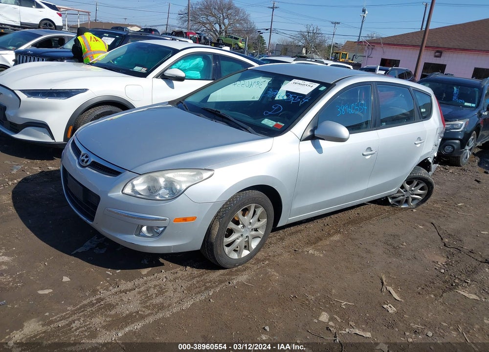 2009 HYUNDAI ELANTRA TOURING VIN: KMHDC86E79U041687