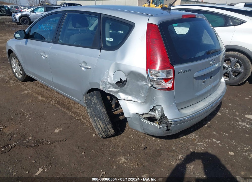 2009 HYUNDAI ELANTRA TOURING VIN: KMHDC86E79U041687
