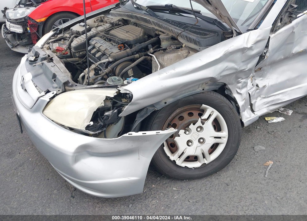 2001 HONDA CIVIC LX VIN: 1HGEM22571L049101