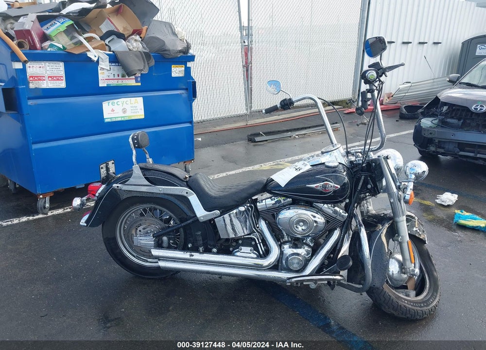 2011 HARLEY-DAVIDSON FLSTC VIN: 1HD1BW519BB039212
