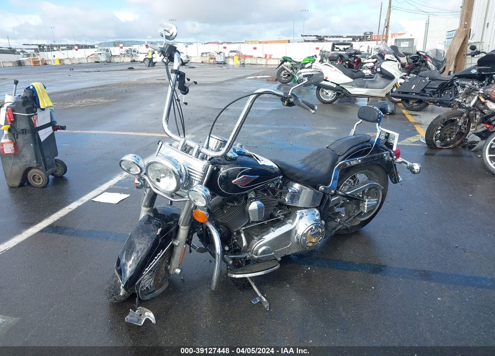 2011 HARLEY-DAVIDSON FLSTC VIN: 1HD1BW519BB039212