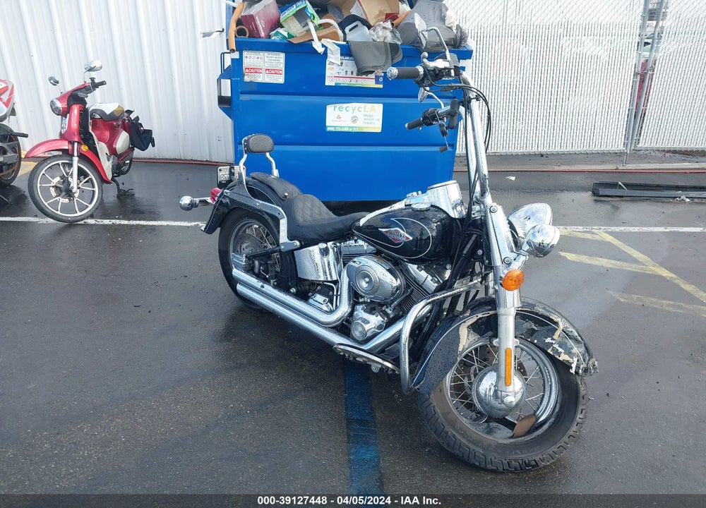 2011 HARLEY-DAVIDSON FLSTC VIN: 1HD1BW519BB039212
