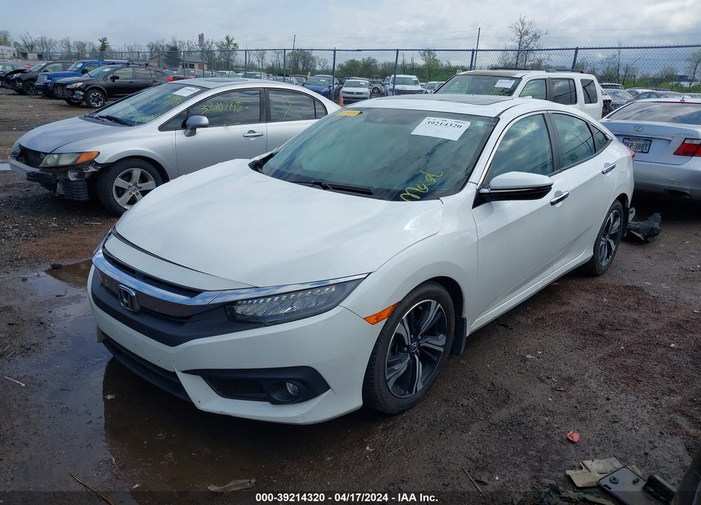 2017 HONDA CIVIC TOURING VIN: 19XFC1F94HE004942