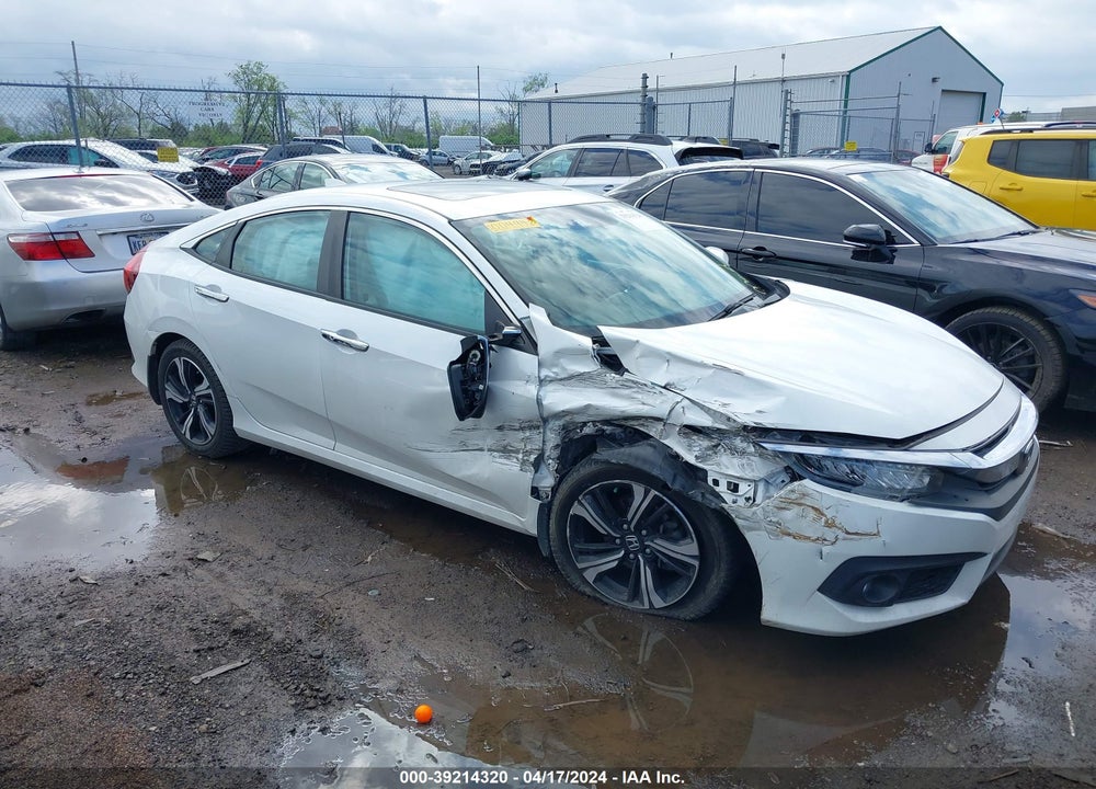 2017 HONDA CIVIC TOURING VIN: 19XFC1F94HE004942
