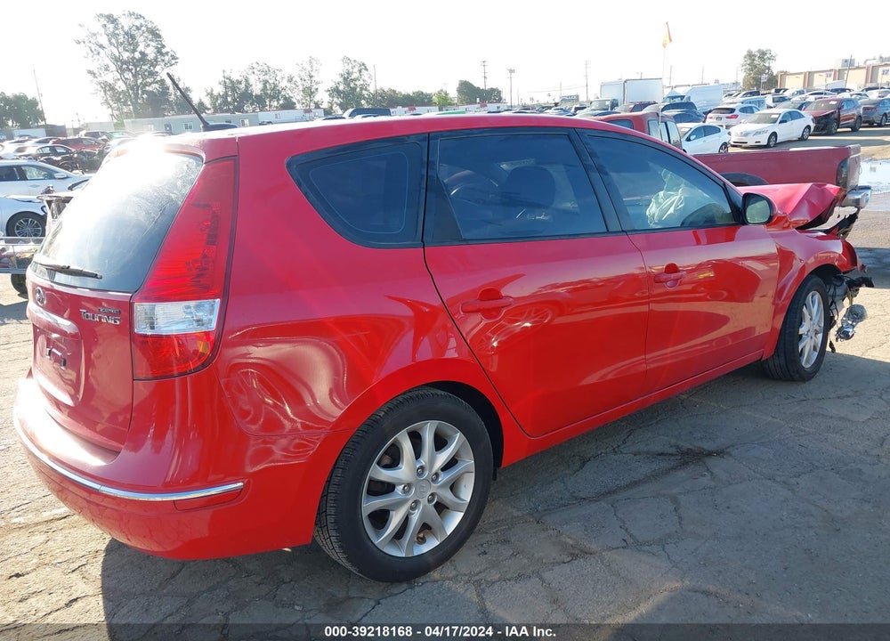 2009 HYUNDAI ELANTRA TOURING VIN: KMHDC86E29U039152