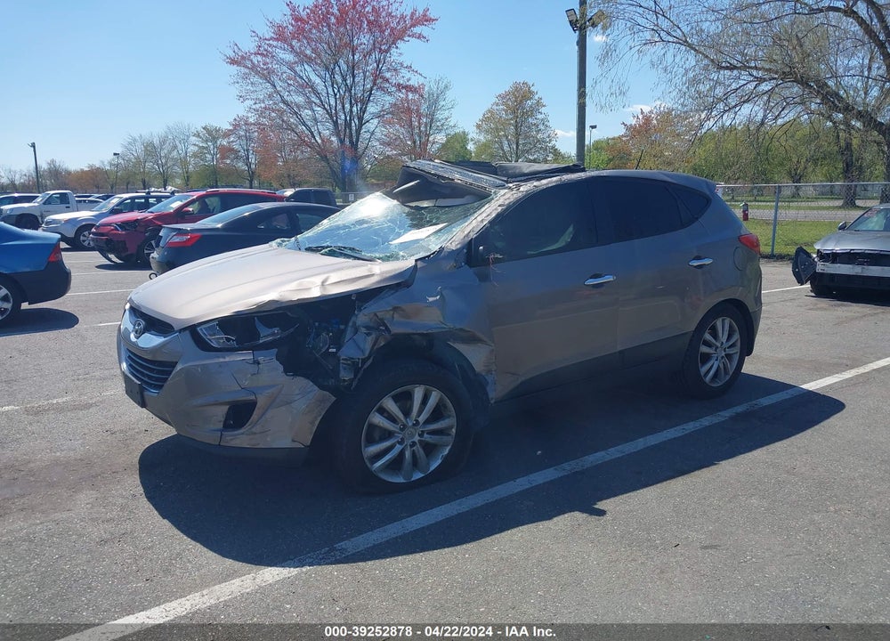 2011 HYUNDAI TUCSON LIMITED VIN: KM8JUCAC1BU227031