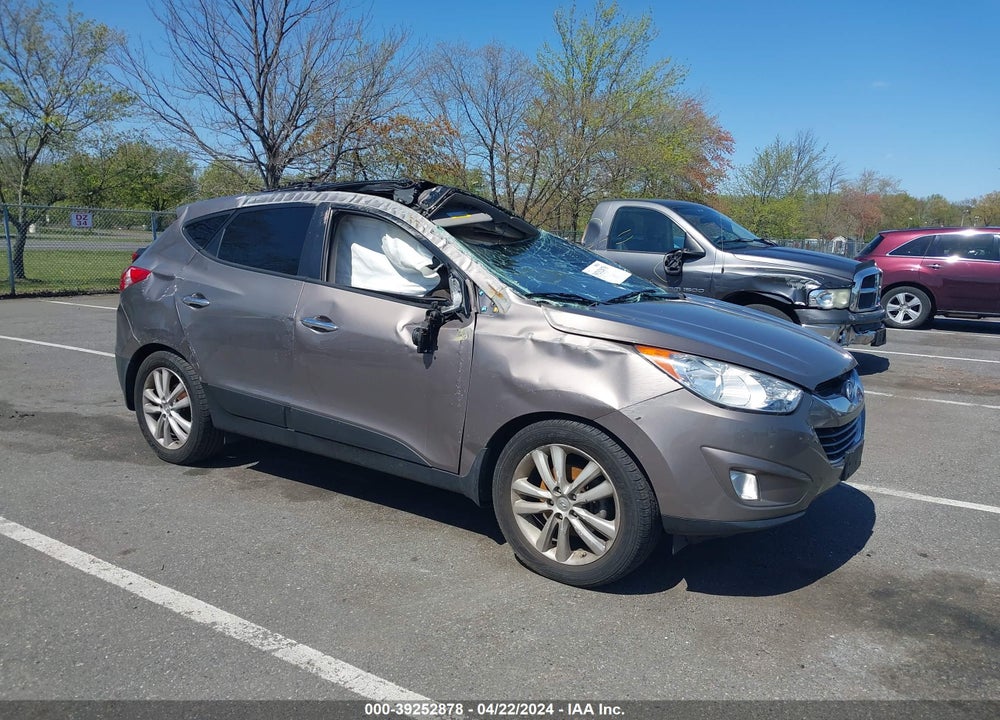 2011 HYUNDAI TUCSON LIMITED VIN: KM8JUCAC1BU227031