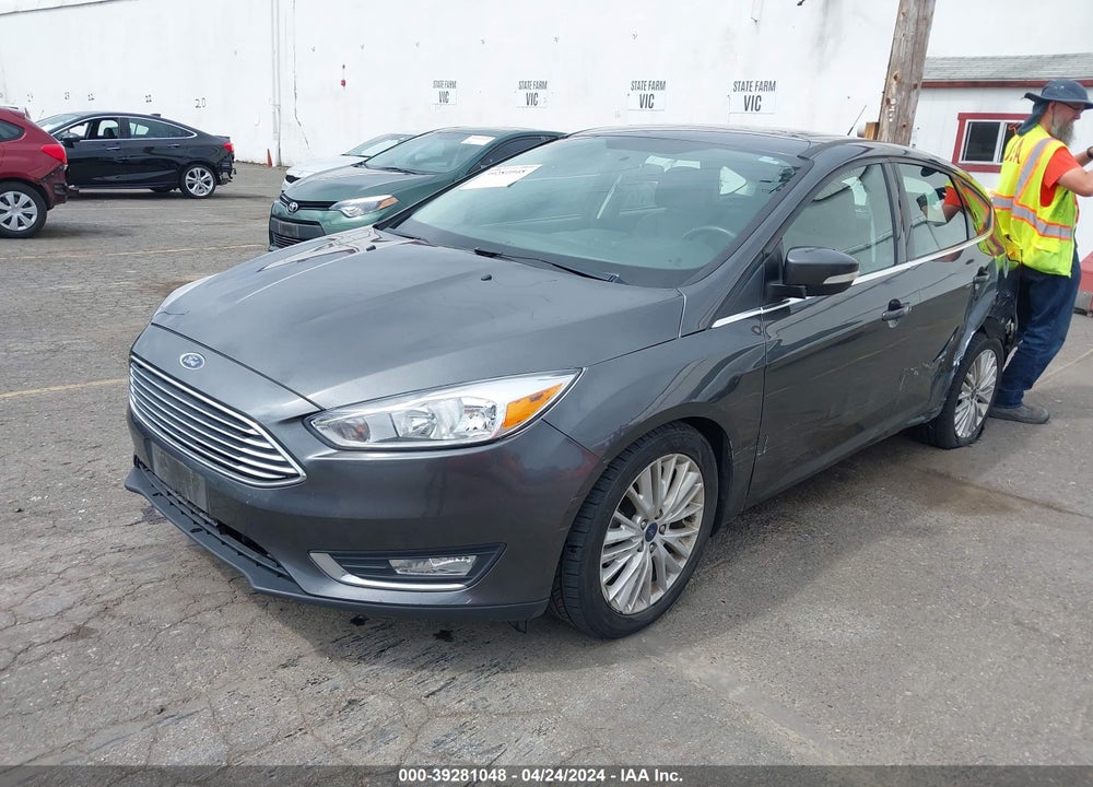 2017 FORD FOCUS TITANIUM VIN: 1FADP3N26HL349009