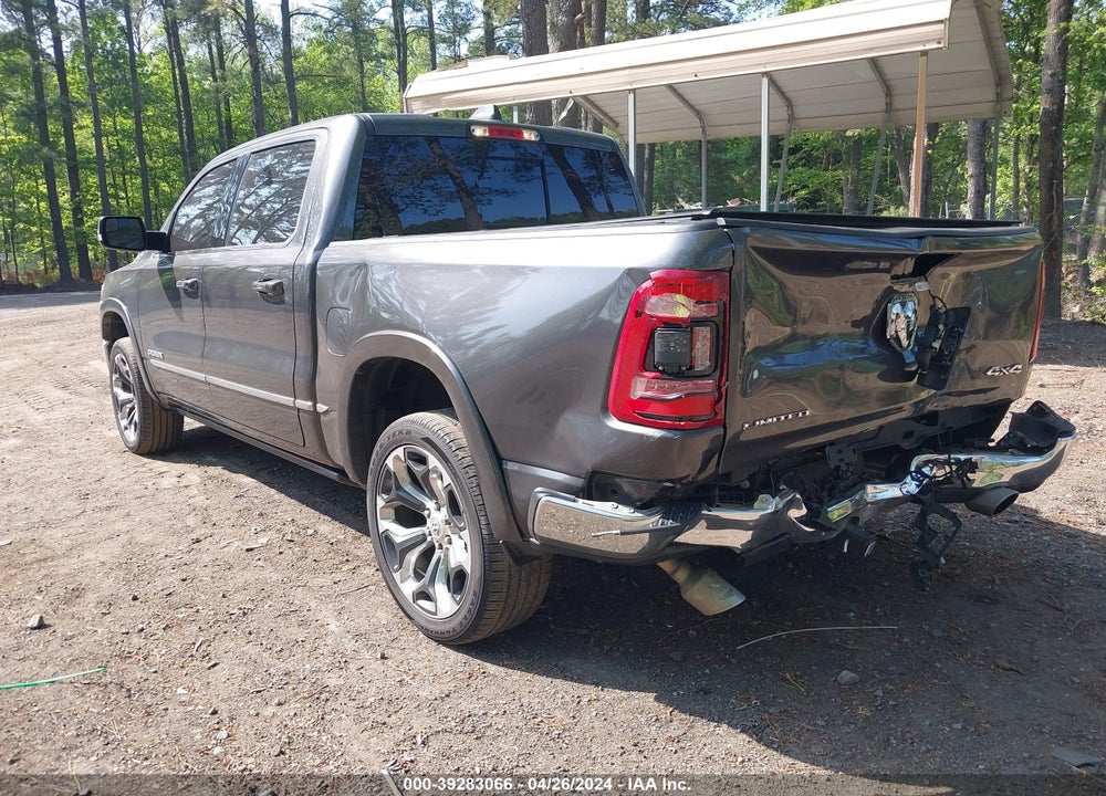 2019 RAM 1500 LIMITED 4X4 5'7 BOX VIN: 1C6SRFHT4KN834950