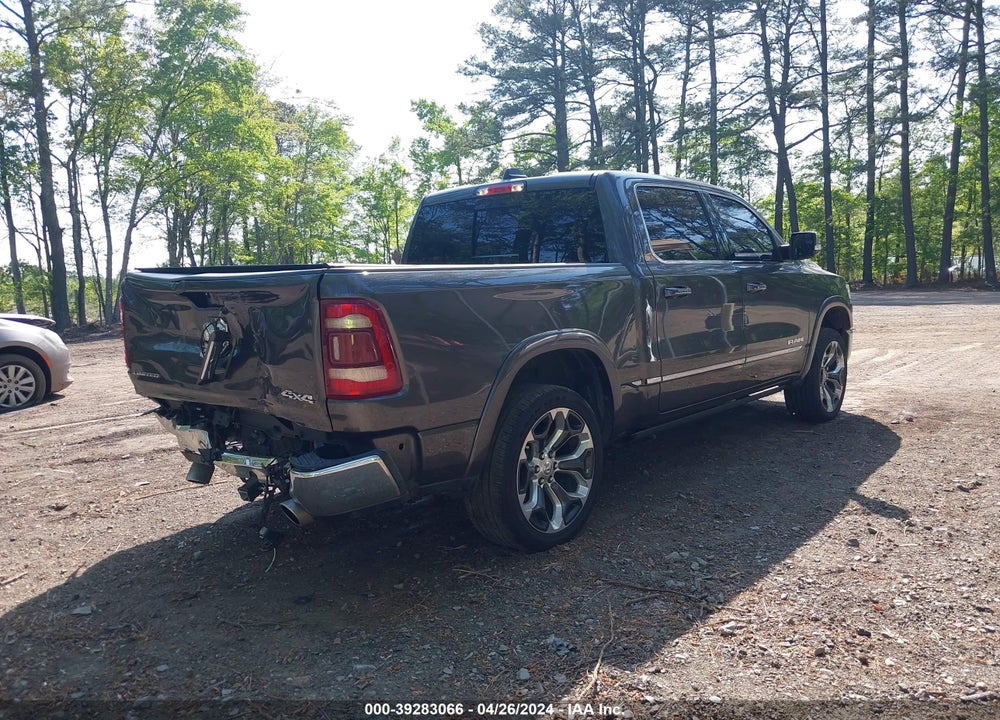 2019 RAM 1500 LIMITED 4X4 5'7 BOX VIN: 1C6SRFHT4KN834950